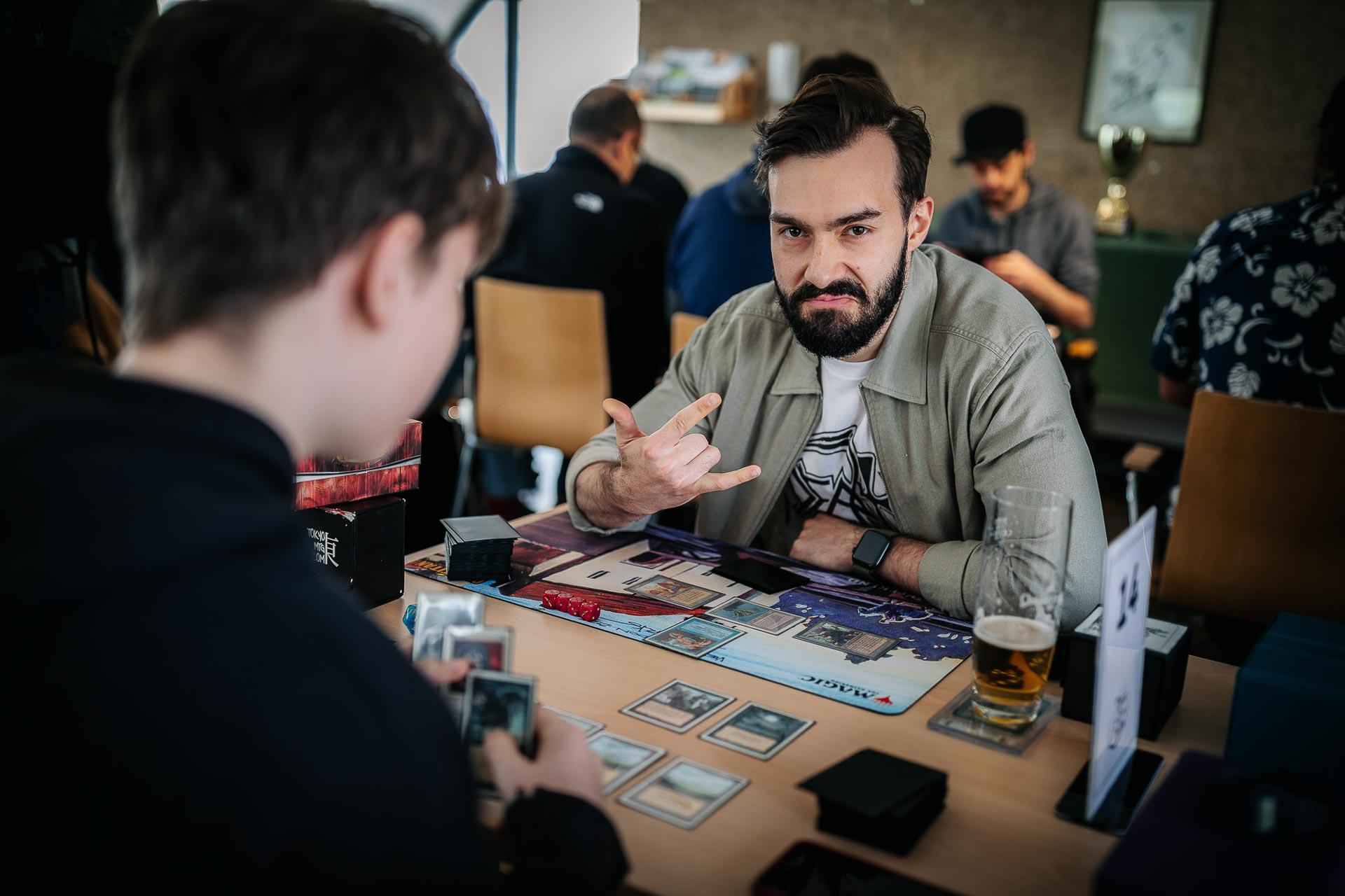VG25-054 Player with a Serendib Efreet and a beer posing for the camera
