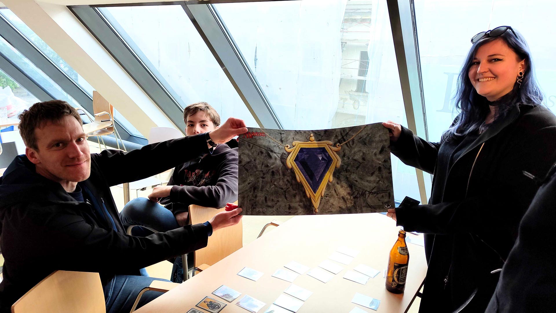 VG25-199 Chriso and Matthias with the Mox Sapphire Playmat signed by Dan Frazier